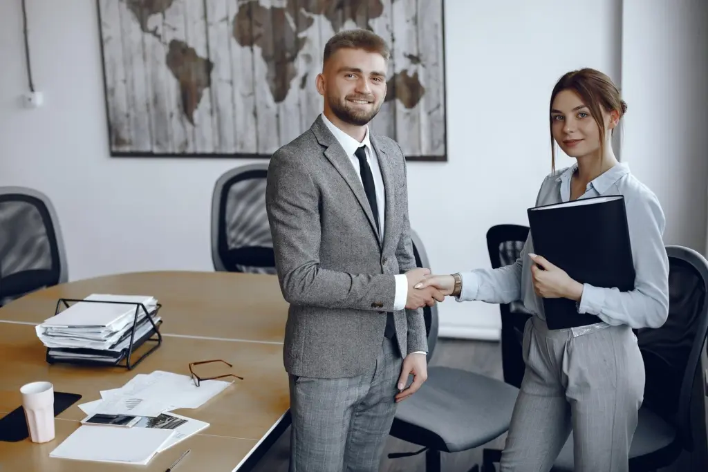 Corporate Lawyer Sydney Shaking Hands With A Client In A Modern Office During A Professional Legal Consultation