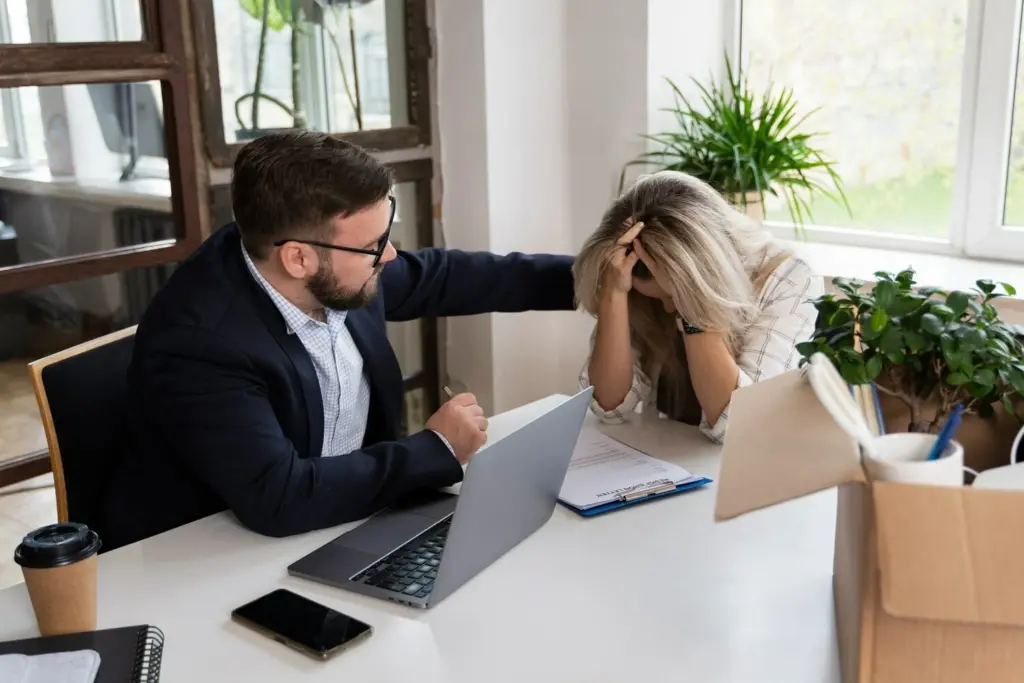 Domestic Violence Lawyer Sydney Comforting A Distressed Client In The Office